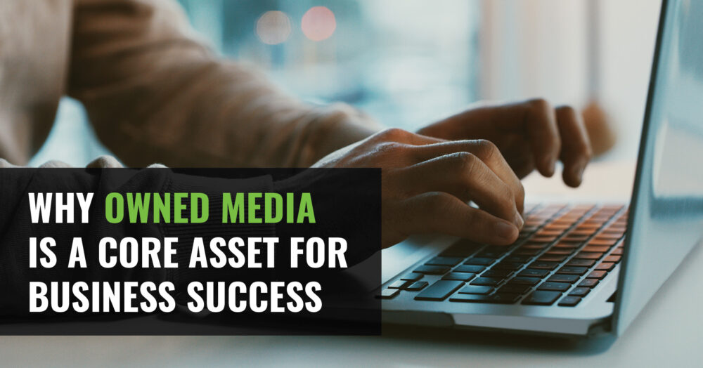 A person typing on a computer with the text Why Owned Media is a Core Asset for Business Success