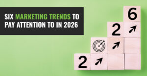Six Marketing Trends to Pay Attention to in 2026 - blocks with 2026 on them stacked on a green background