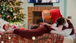 Family watching TV at Christmas - Branding Strategies