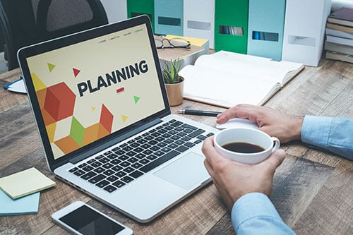 A Man Working on a Strategic Marketing Plan
